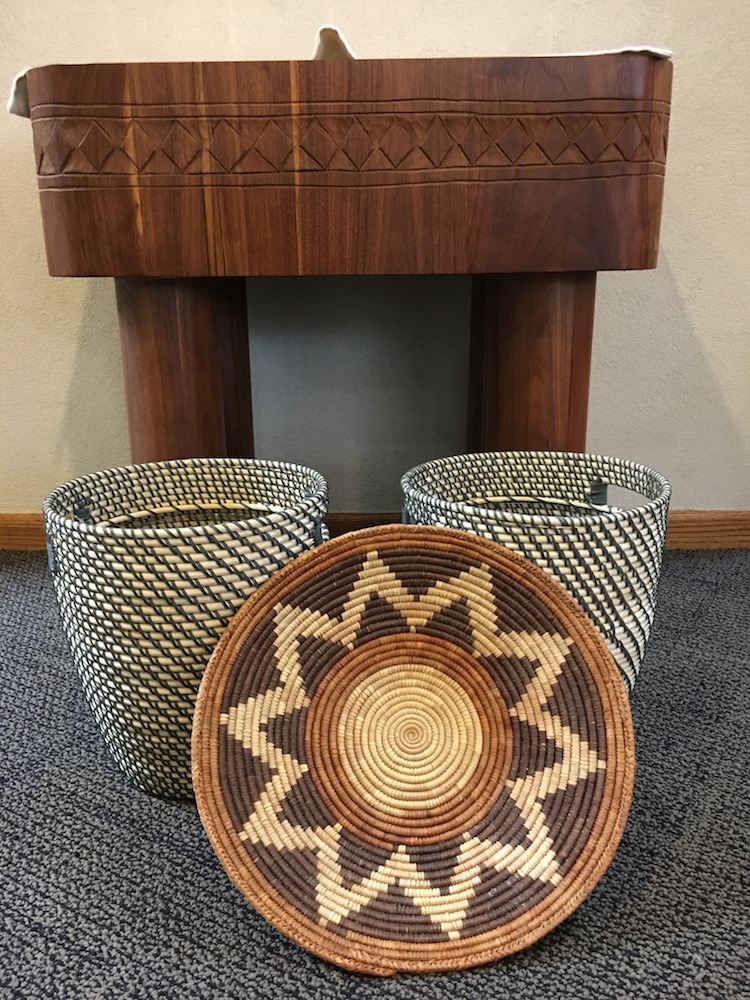 African style baskets used for the tithe collection during mass.